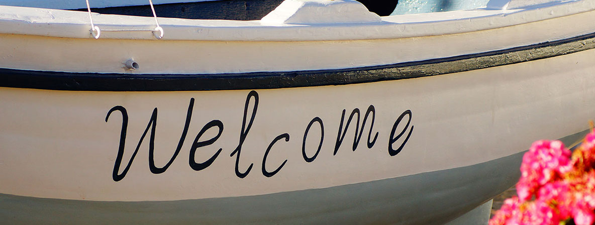 Traditional wooden boat at the hotel entrance